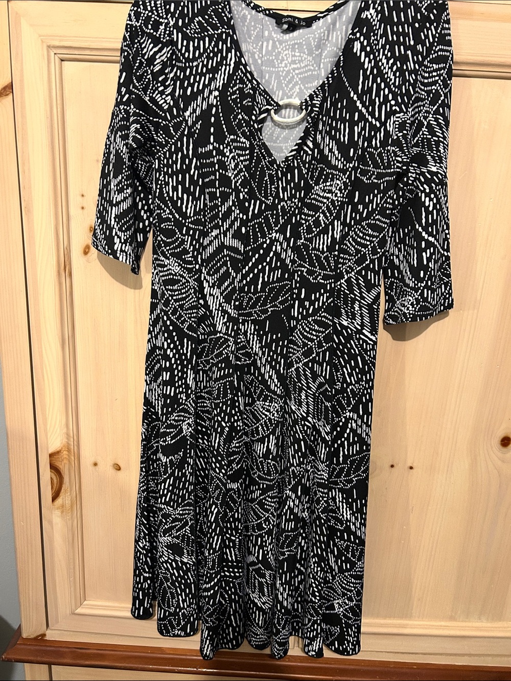 Sami & Jo Black and White V-Neck Midi Dress with Ring Detail